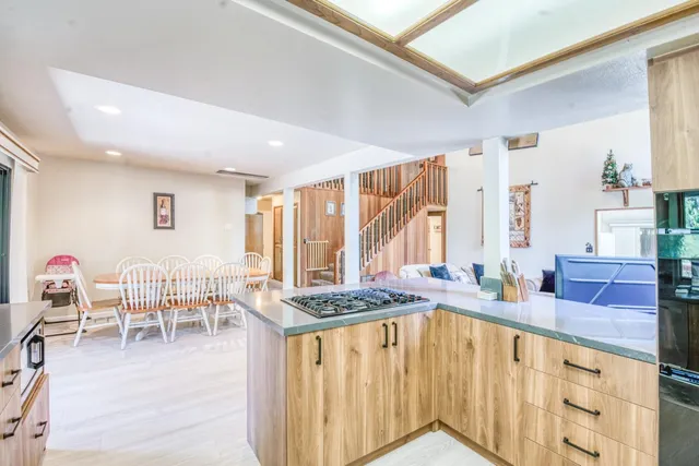 a bedroom with furniture and a wooden floor