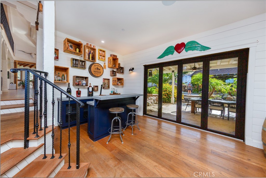 85 Saddlebow Road Bell Canyon, CA 91307 - Photo 22 of 75 a view of a dining room with furniture and a floor to ceiling window
