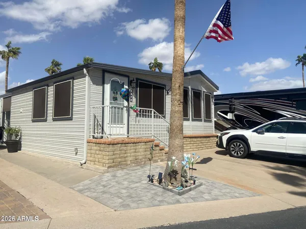 a view of a car parked in front of a house