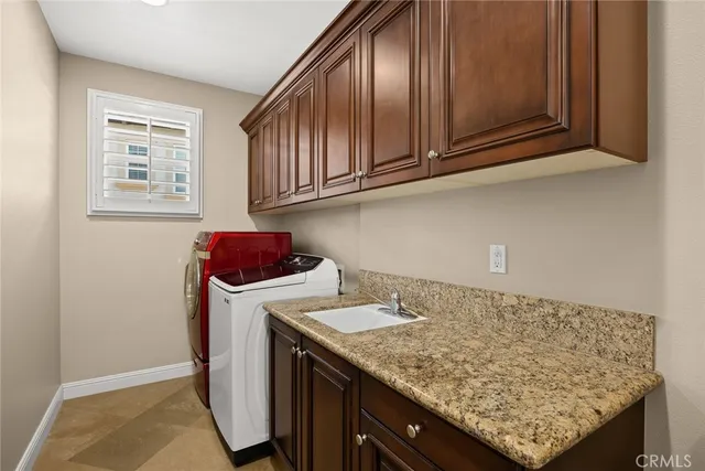 a spacious bathroom with a granite countertop tub sink and mirror