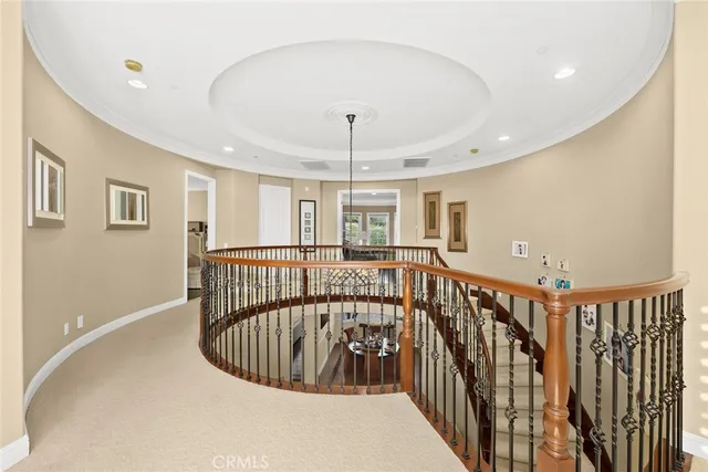 a bedroom with a bed and a dresser in it