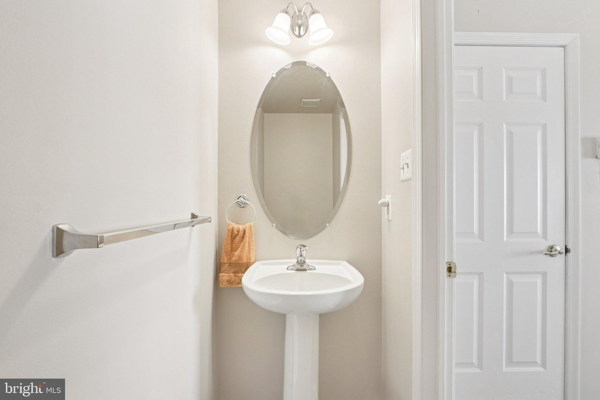 24 Compass Circle Mount Laurel, NJ 08054 - Photo 25 of 61 a bathroom with a sink a mirror and a shower