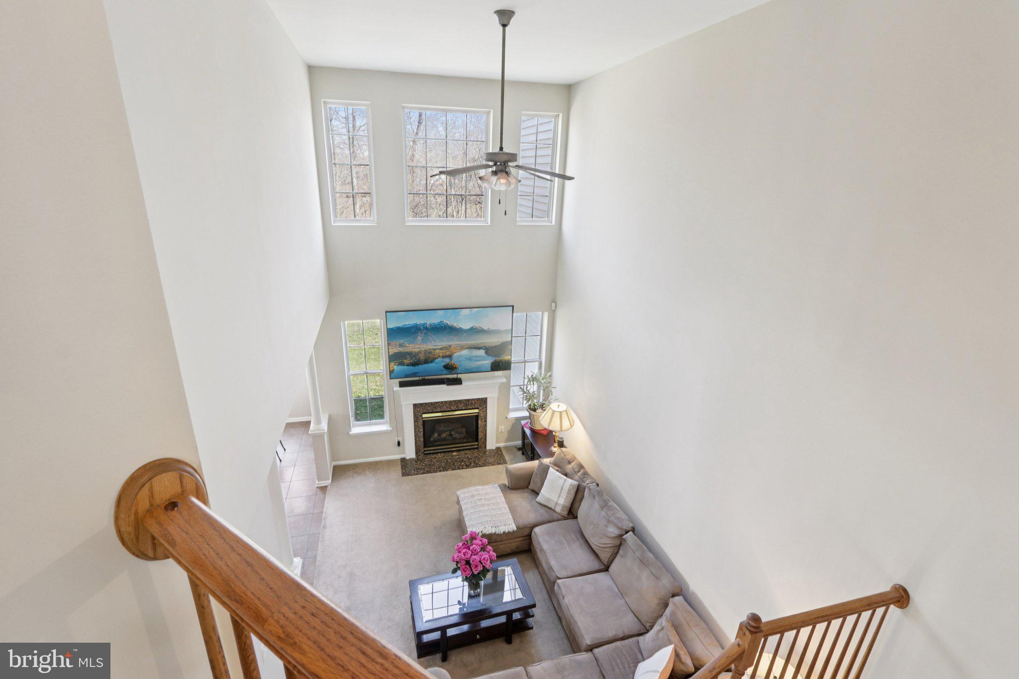 24 Compass Circle Mount Laurel, NJ 08054 - Photo 27 of 61 a living room with furniture and a fireplace