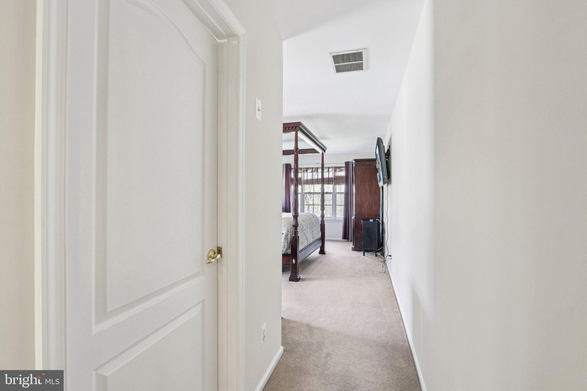 24 Compass Circle Mount Laurel, NJ 08054 - Photo 29 of 61 a view of a hallway with wooden floor and entryway