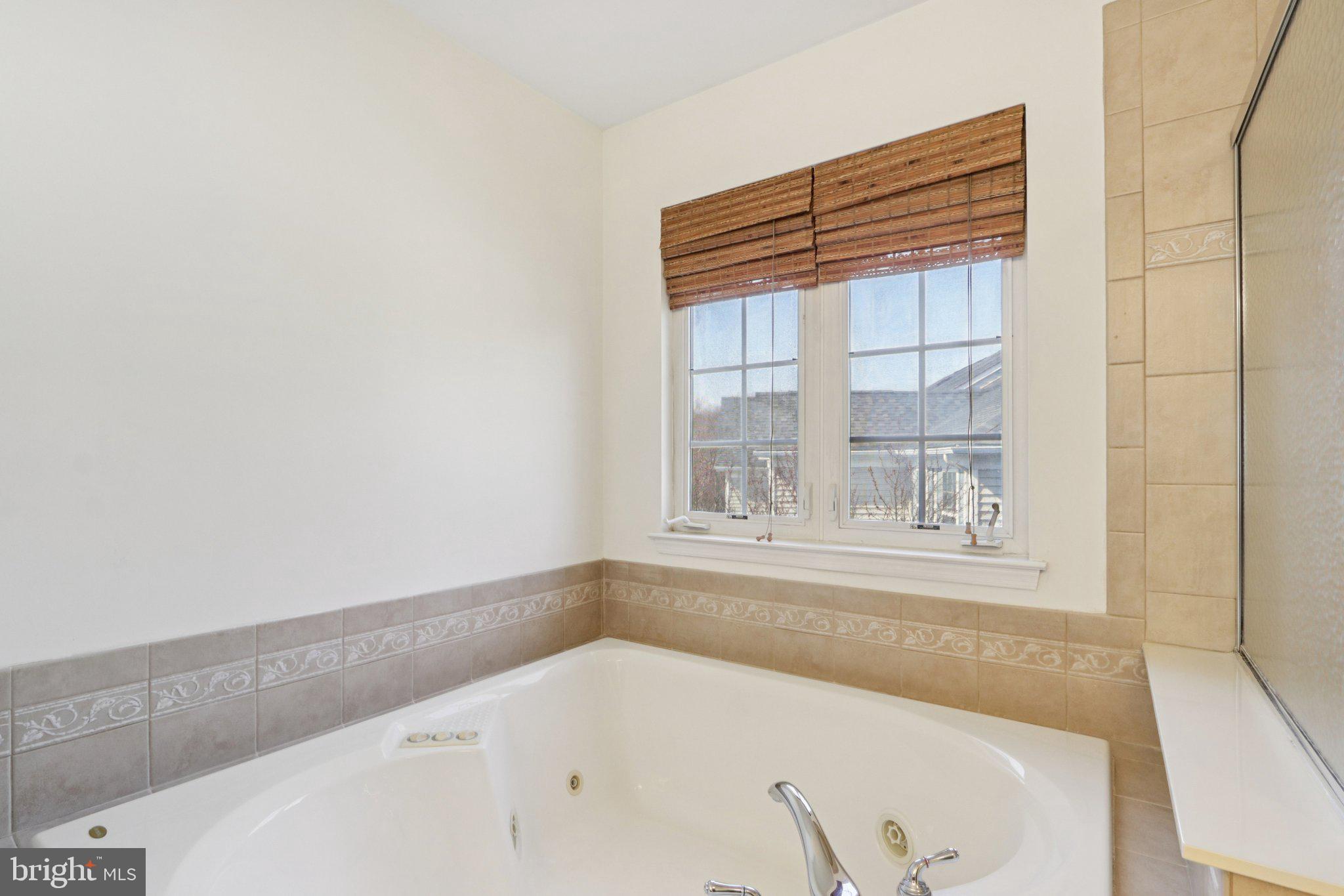 24 Compass Circle Mount Laurel, NJ 08054 - Photo 35 of 61 a bathroom with a bathtub and next to a window