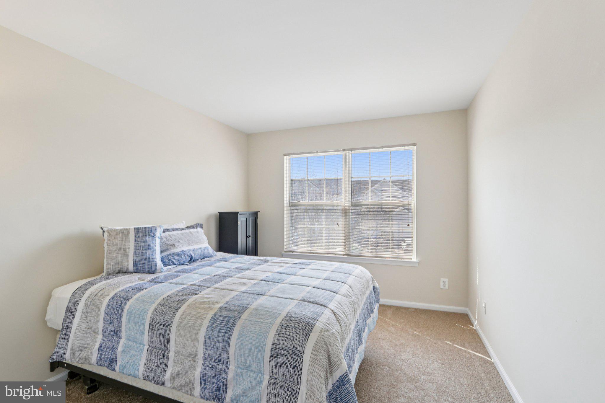 24 Compass Circle Mount Laurel, NJ 08054 - Photo 38 of 61 a bedroom with a bed and a window