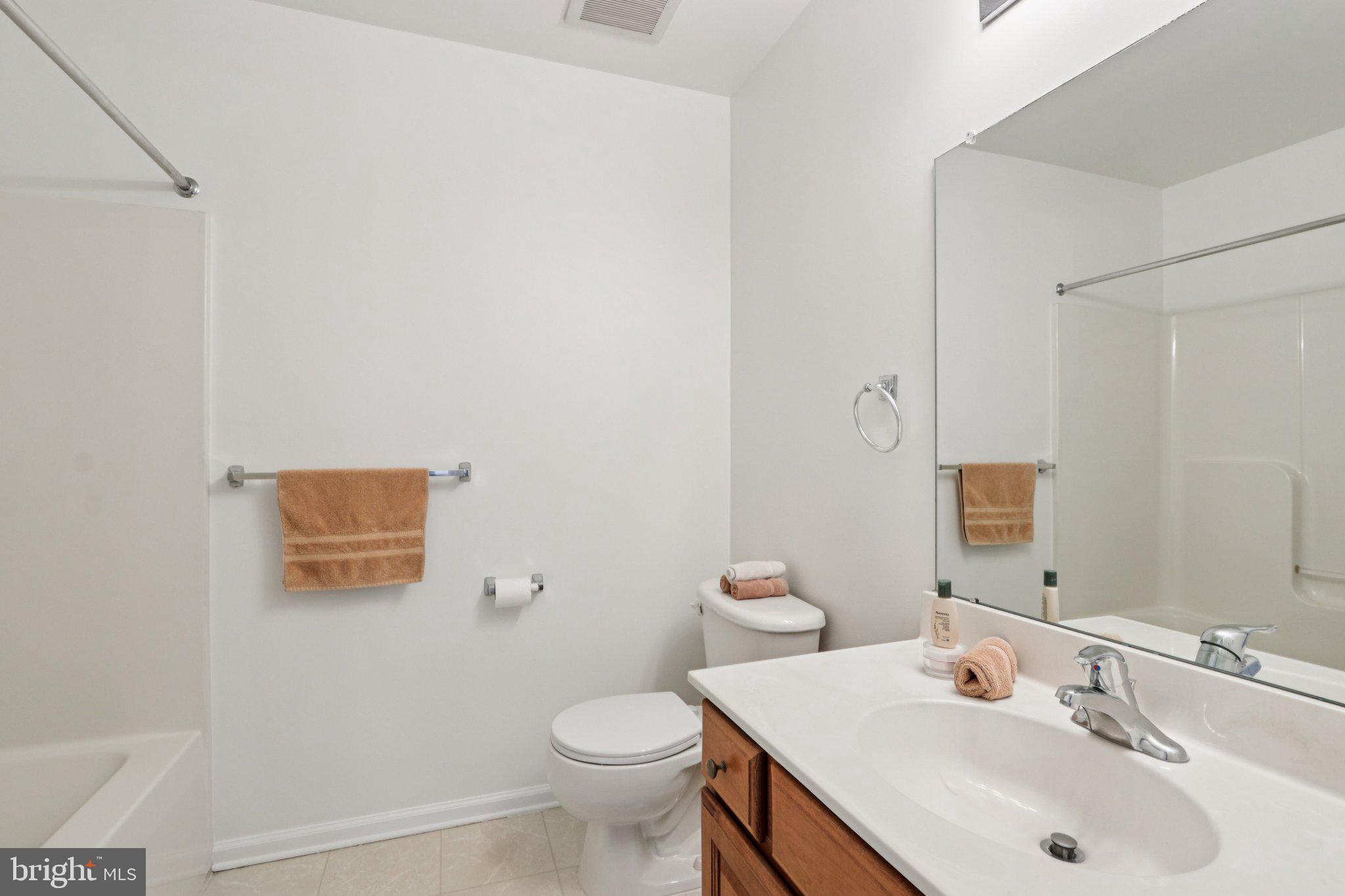 24 Compass Circle Mount Laurel, NJ 08054 - Photo 42 of 61 a bathroom with a sink a toilet and mirror