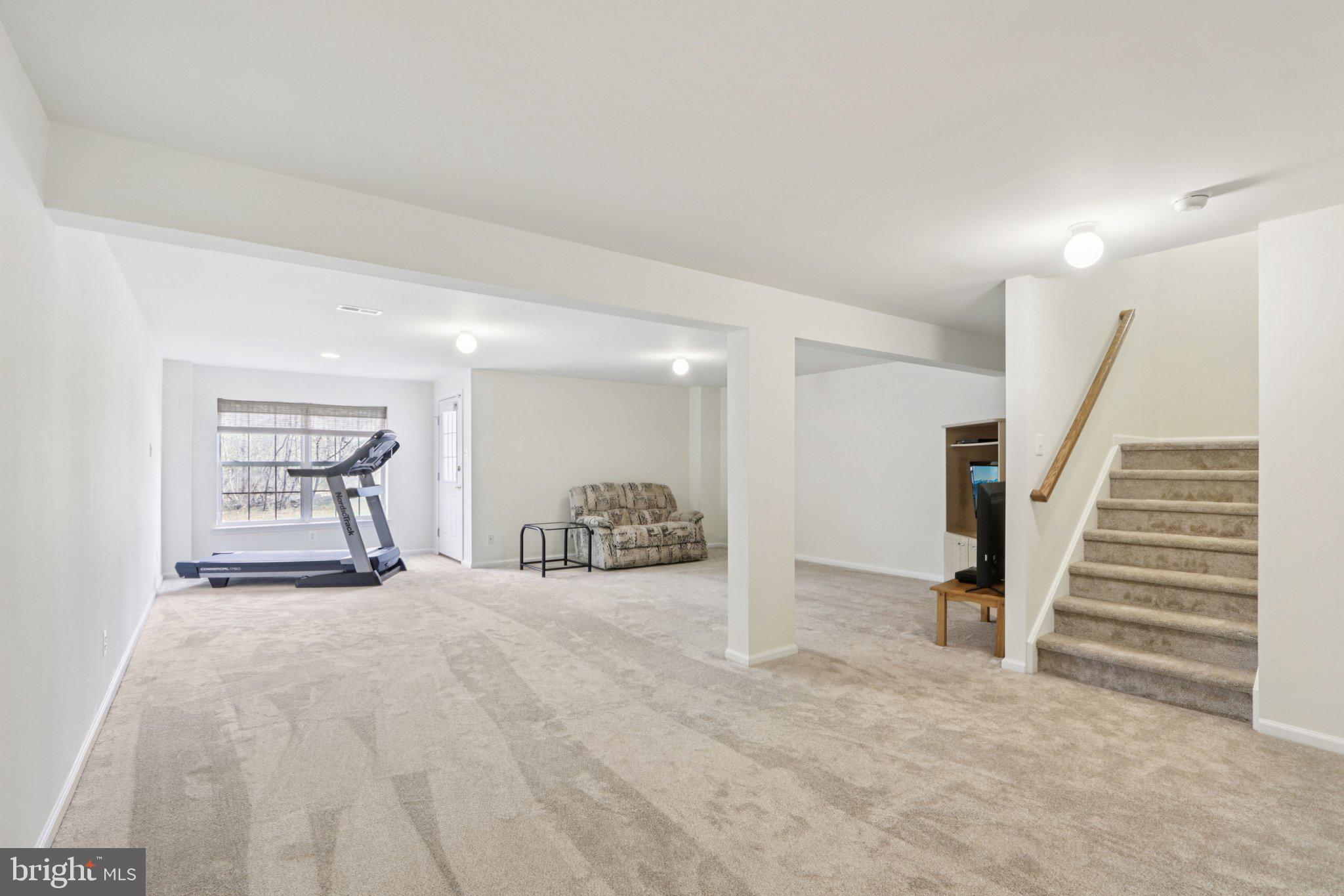 24 Compass Circle Mount Laurel, NJ 08054 - Photo 46 of 61 a view of a room with stairs and a window