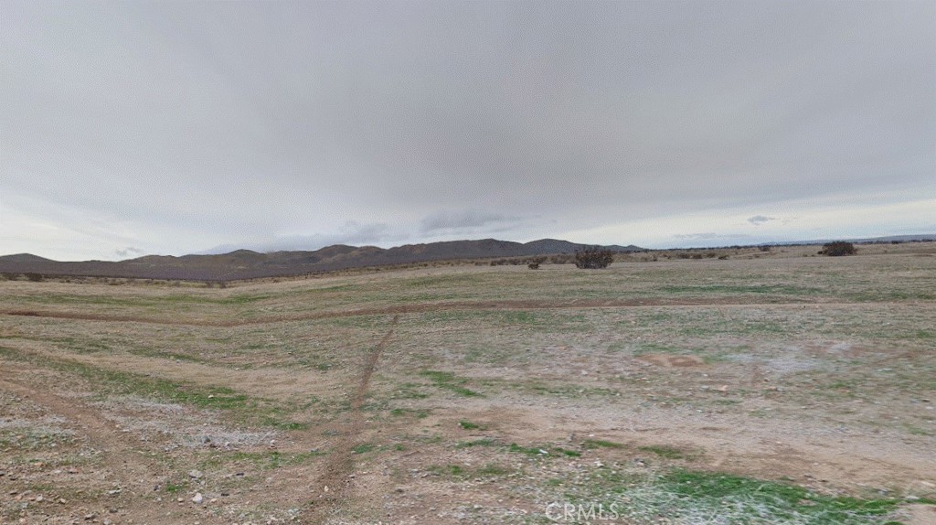 0 Wild Wash Road Oro Grande, CA 92368 - Photo 1 of 9 a view of lake with mountain