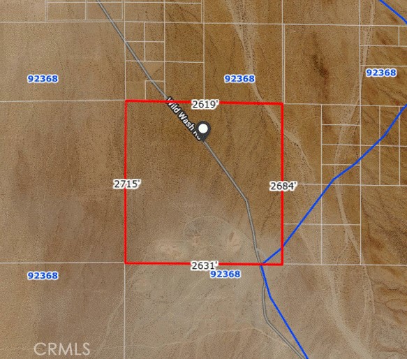 0 Wild Wash Road Oro Grande, CA 92368 - Photo 5 of 9 a bathroom with a shower and a mirror