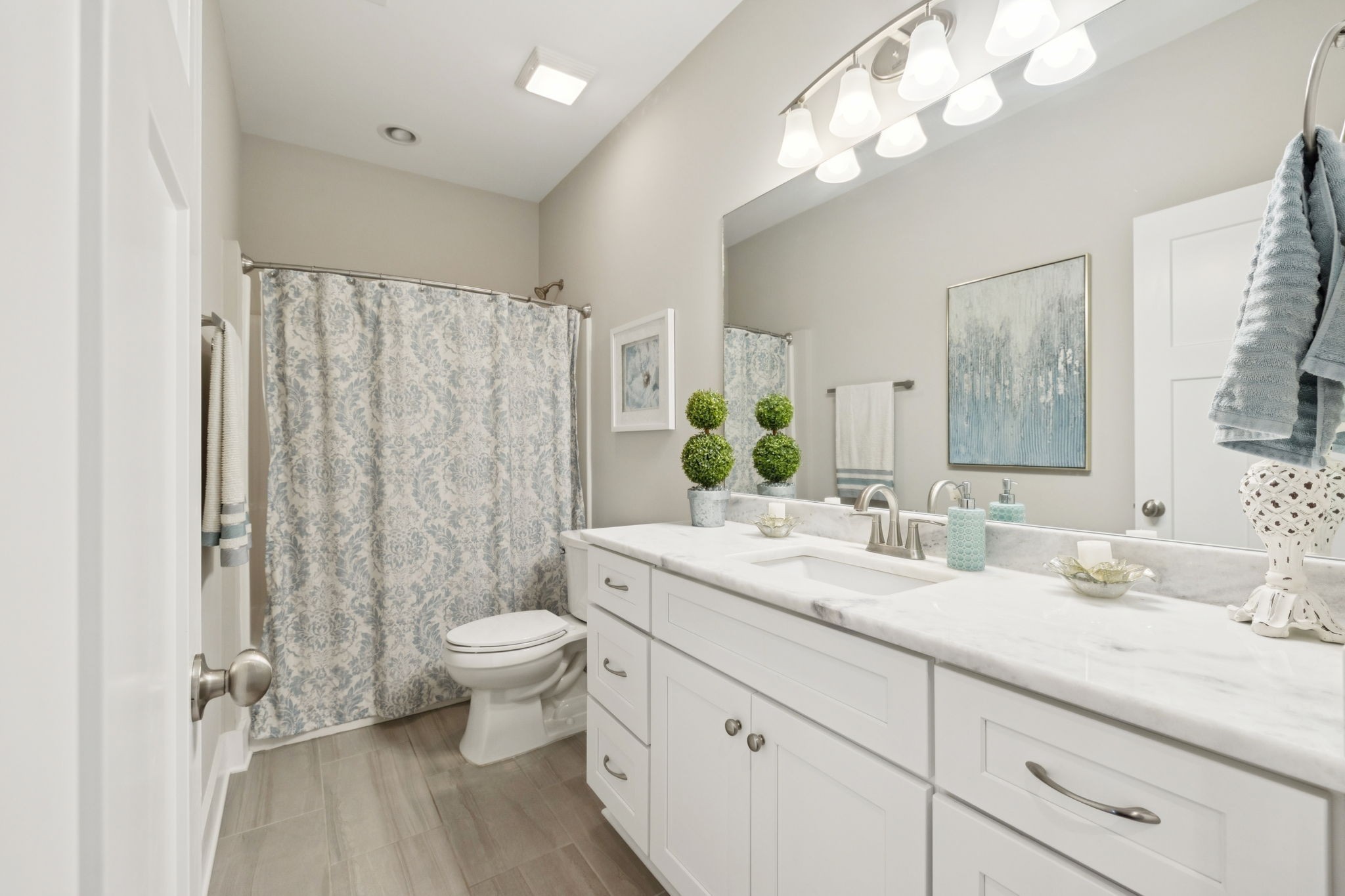 1964 Harkreader Road Mount Juliet, TN 37122 - Photo 17 of 80 a bathroom with a double vanity sink mirror and toilet