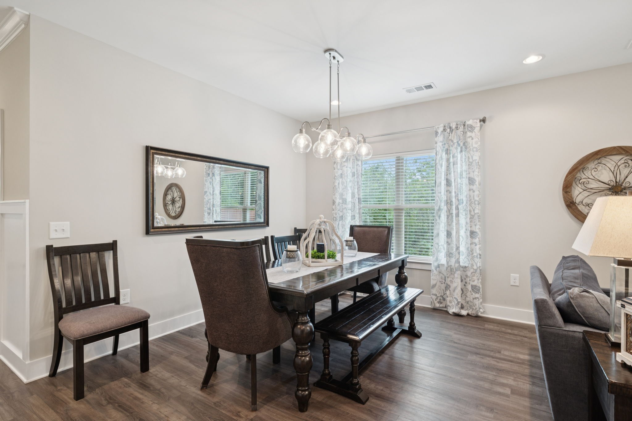 1964 Harkreader Road Mount Juliet, TN 37122 - Photo 19 of 80 a dining room with furniture a chandelier and wooden floor