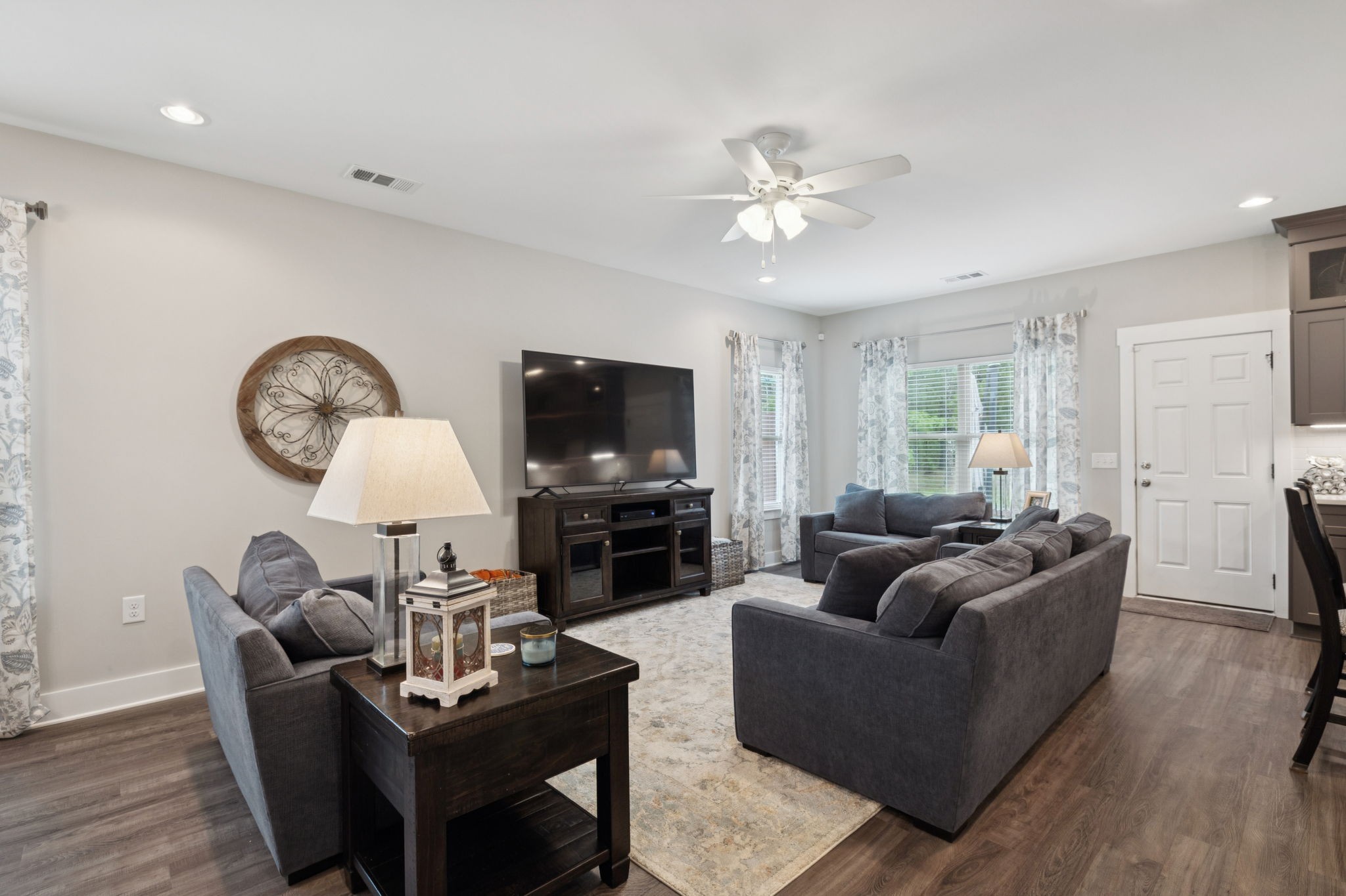 1964 Harkreader Road Mount Juliet, TN 37122 - Photo 20 of 80 a living room with furniture a fireplace and a flat screen tv