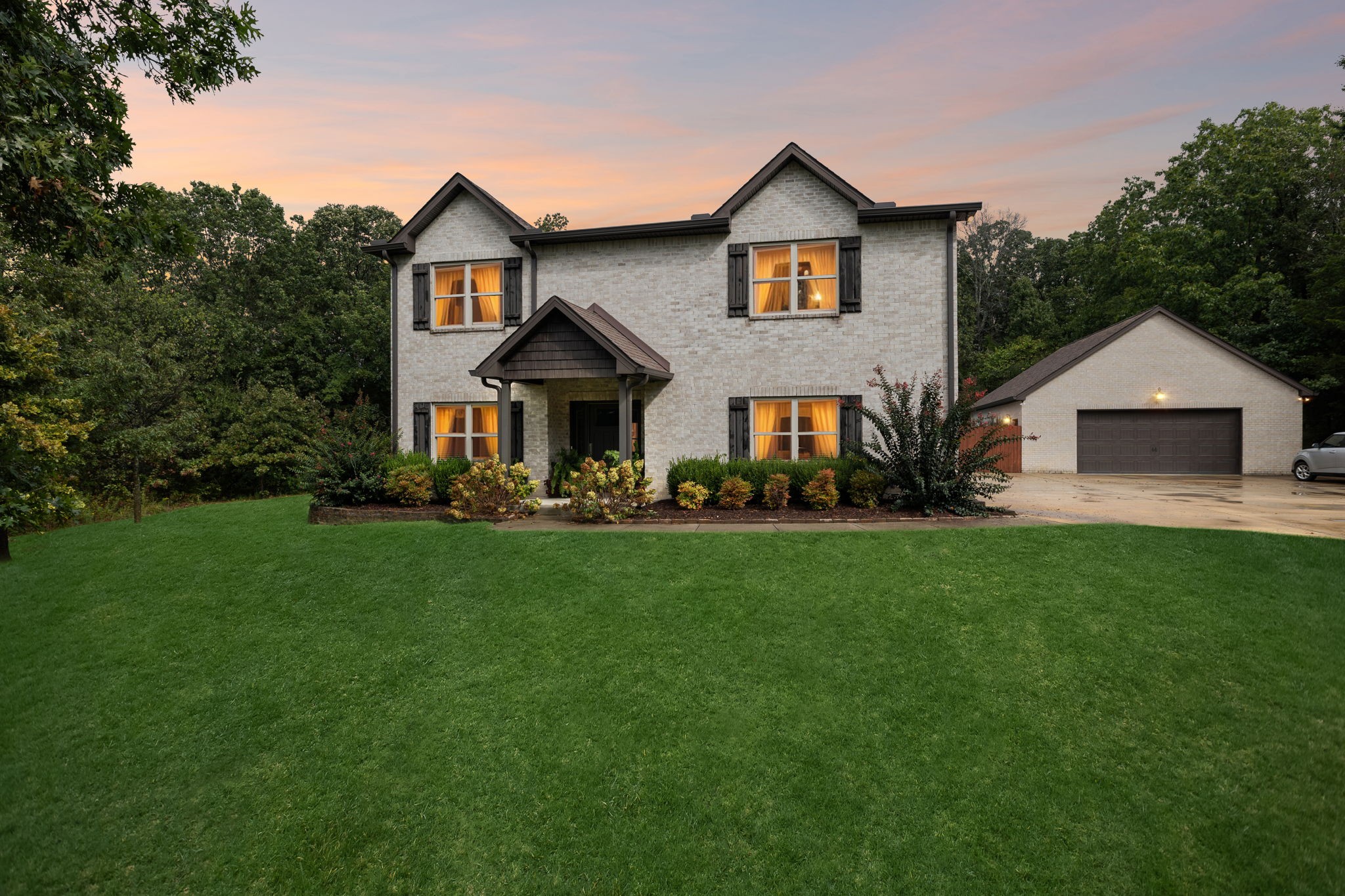 1964 Harkreader Road Mount Juliet, TN 37122 - Photo 2 of 80 a front view of a house with a yard and trees