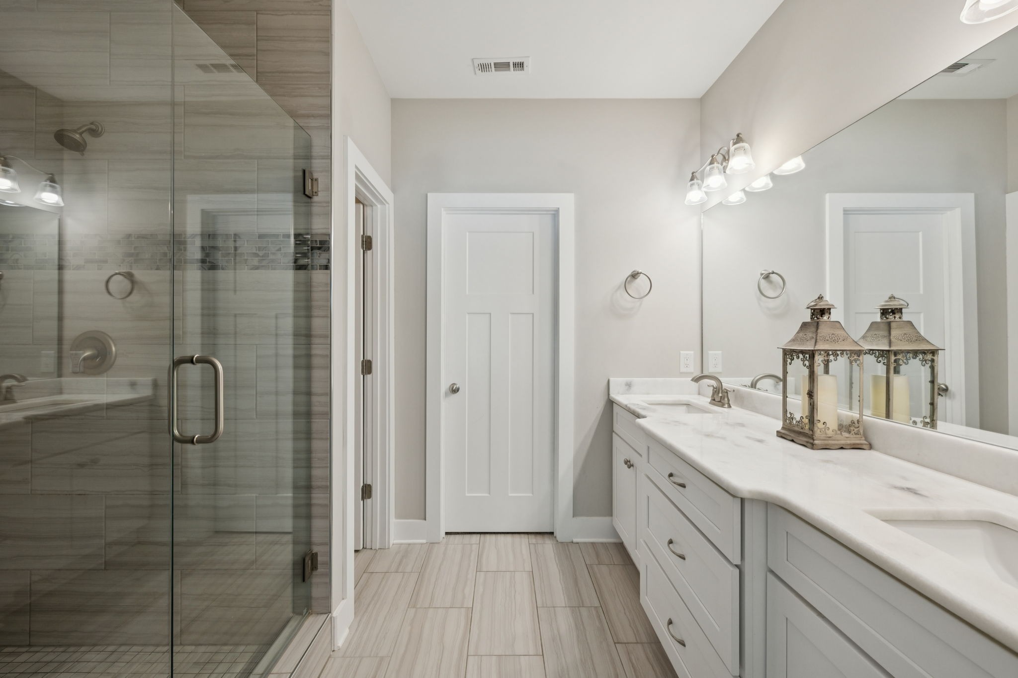 1964 Harkreader Road Mount Juliet, TN 37122 - Photo 33 of 80 a spacious bathroom with a double vanity sink a large mirror and shower