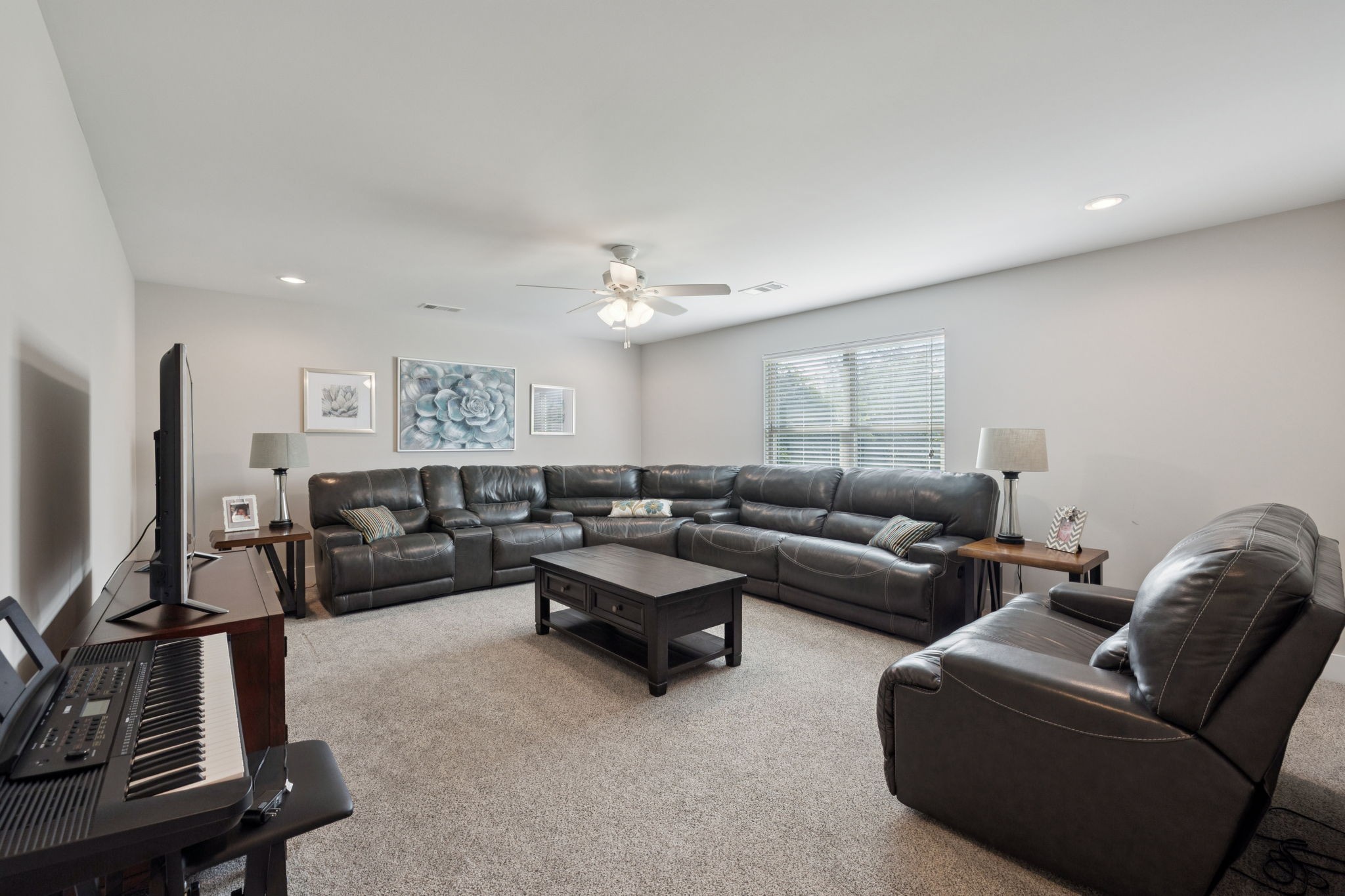 1964 Harkreader Road Mount Juliet, TN 37122 - Photo 36 of 80 a living room with furniture and a flat screen tv