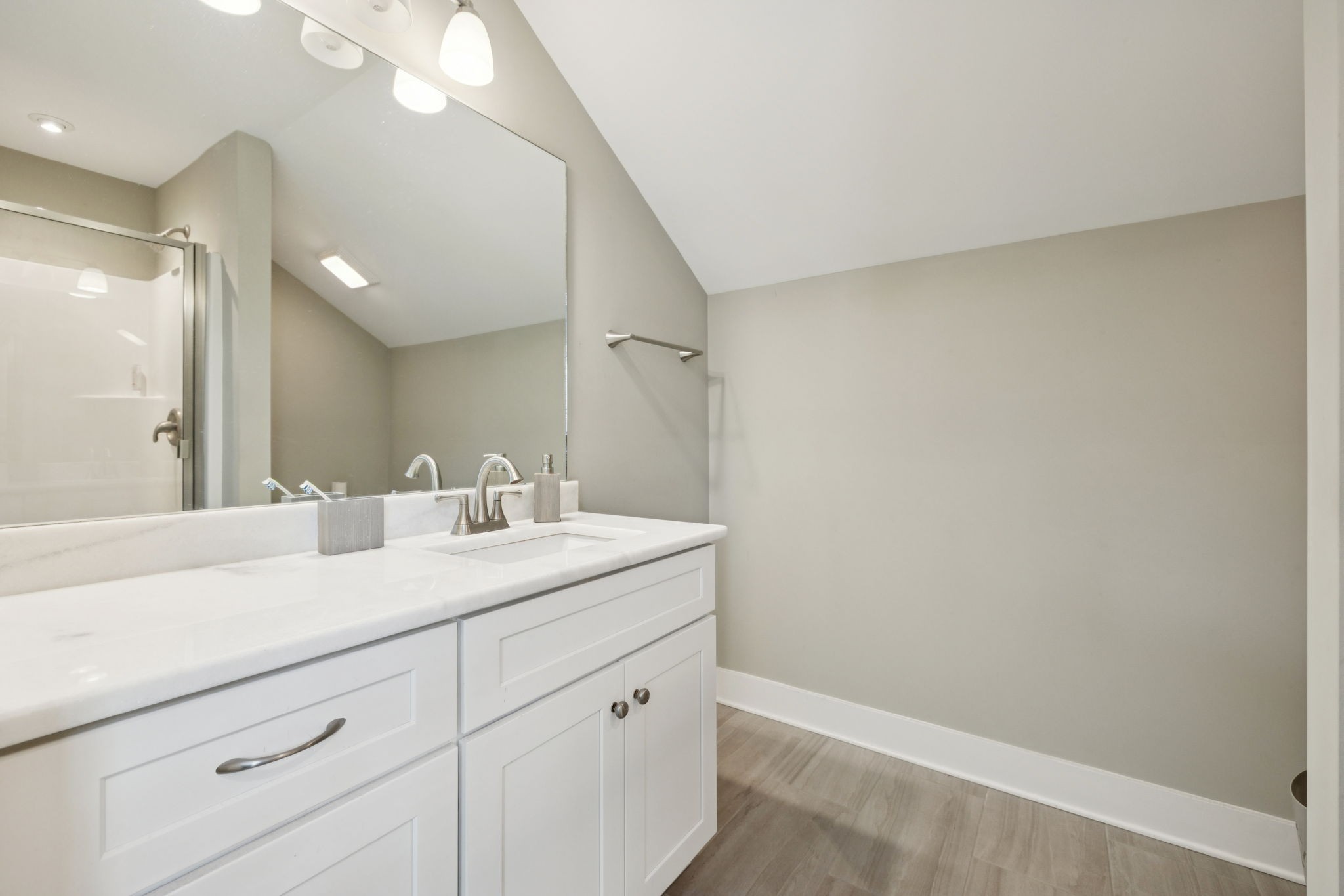 1964 Harkreader Road Mount Juliet, TN 37122 - Photo 41 of 80 a bathroom with a sink and a mirror