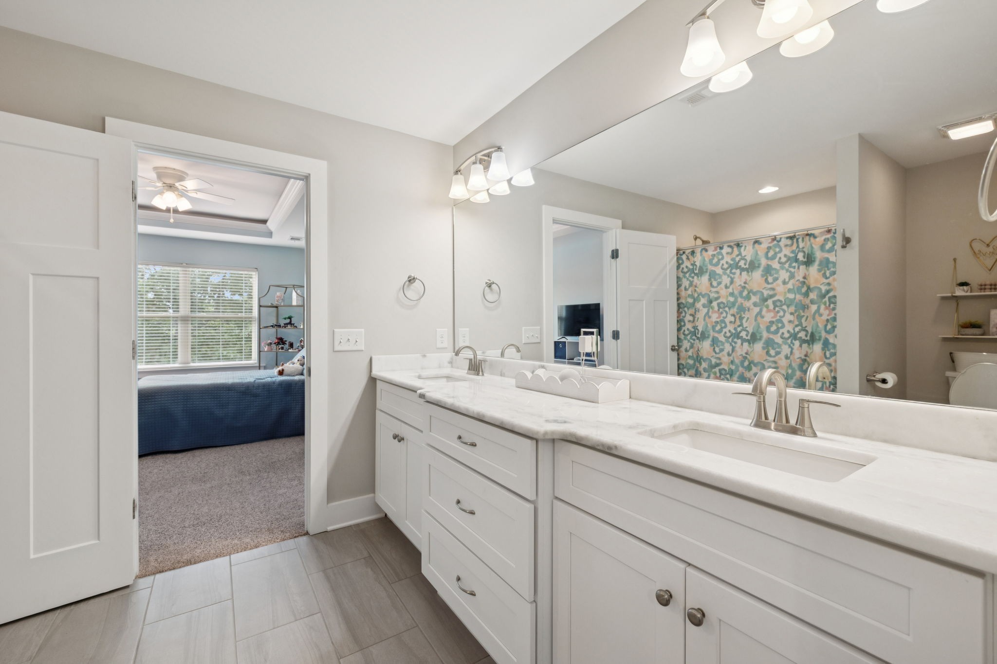 1964 Harkreader Road Mount Juliet, TN 37122 - Photo 44 of 80 a spacious bathroom with a double vanity sink a mirror and a shower