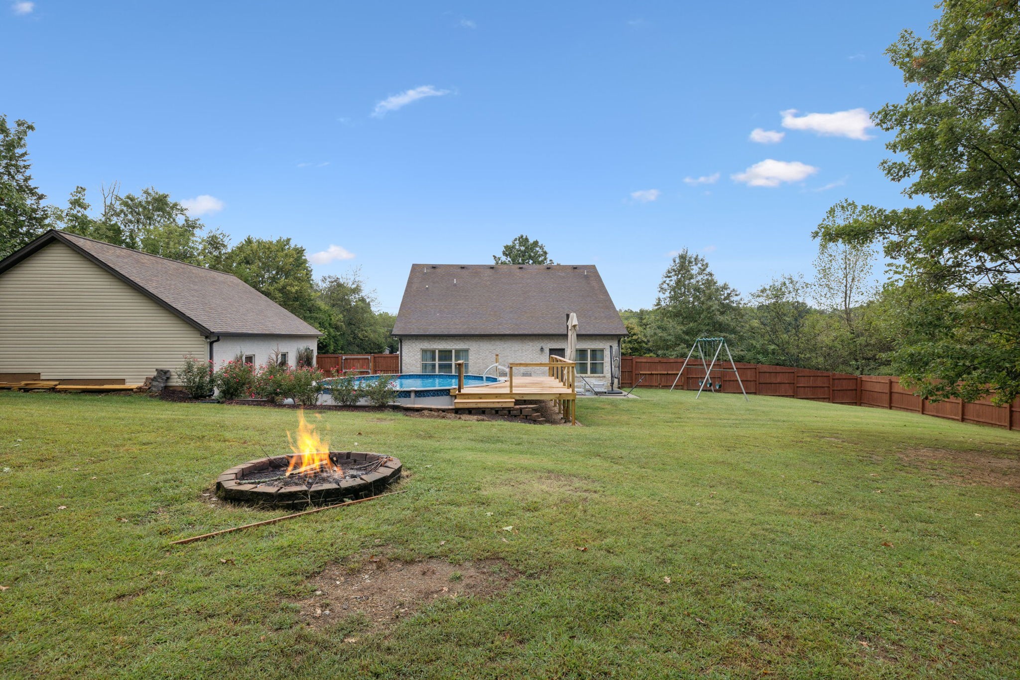 1964 Harkreader Road Mount Juliet, TN 37122 - Photo 63 of 80 a view of a house with backyard and a garden