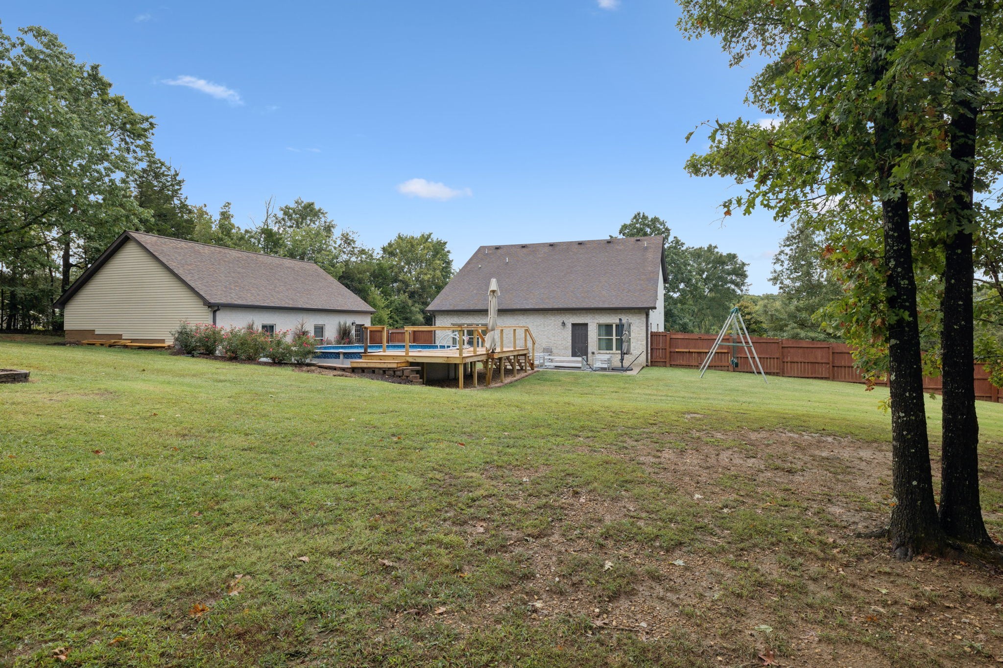 1964 Harkreader Road Mount Juliet, TN 37122 - Photo 64 of 80 a view of a house with backyard and a tree