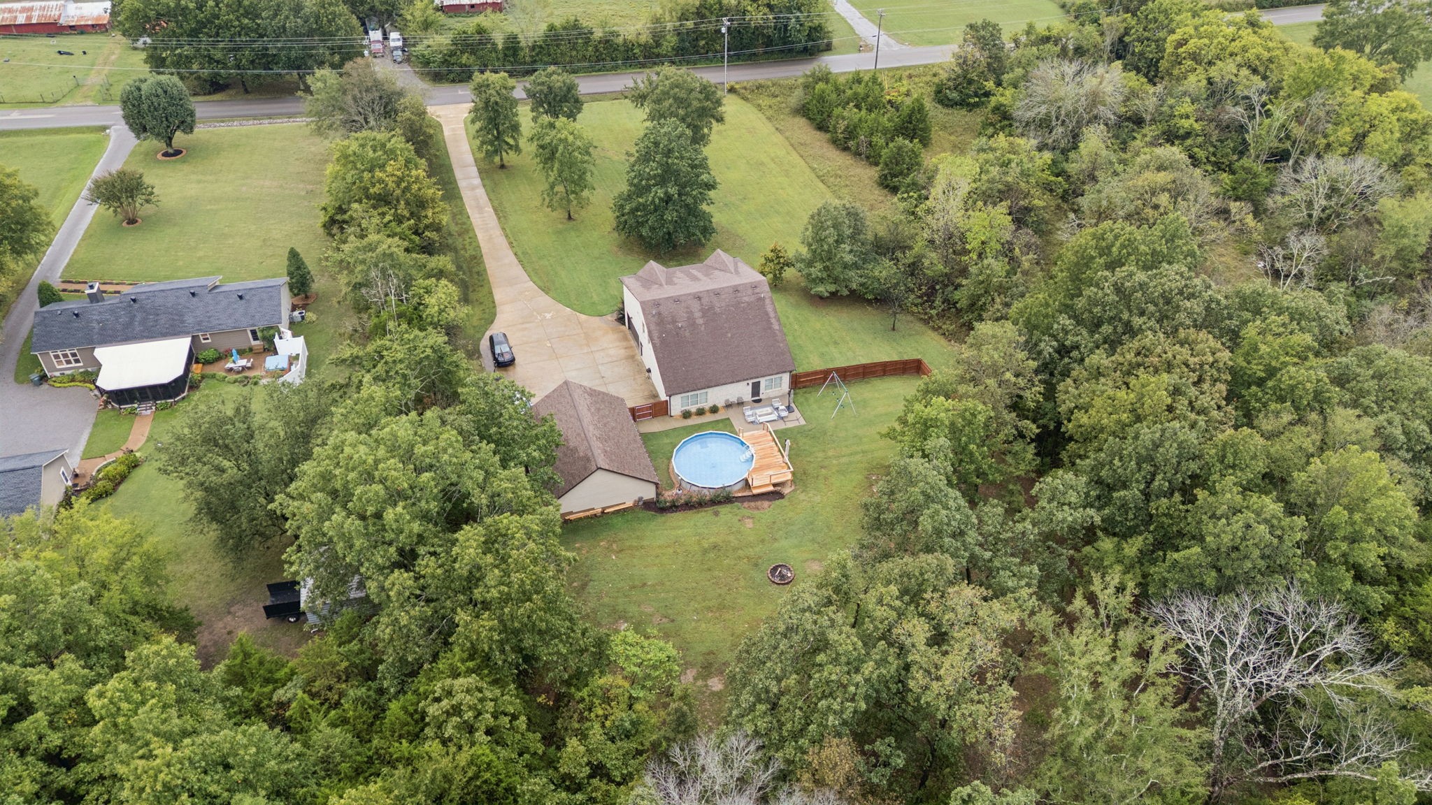 1964 Harkreader Road Mount Juliet, TN 37122 - Photo 76 of 80 an aerial view of a house with a yard and lake view