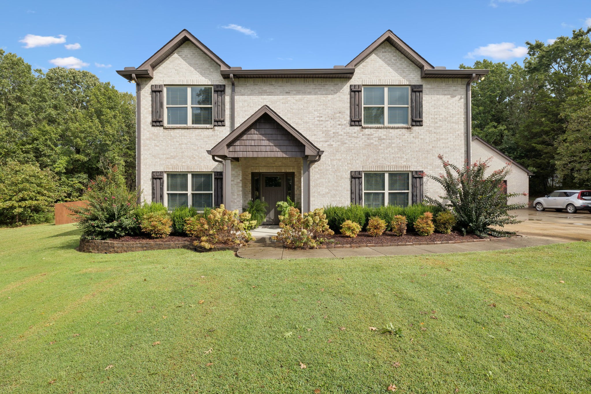1964 Harkreader Road Mount Juliet, TN 37122 - Photo 8 of 80 a front view of a house with yard and green space