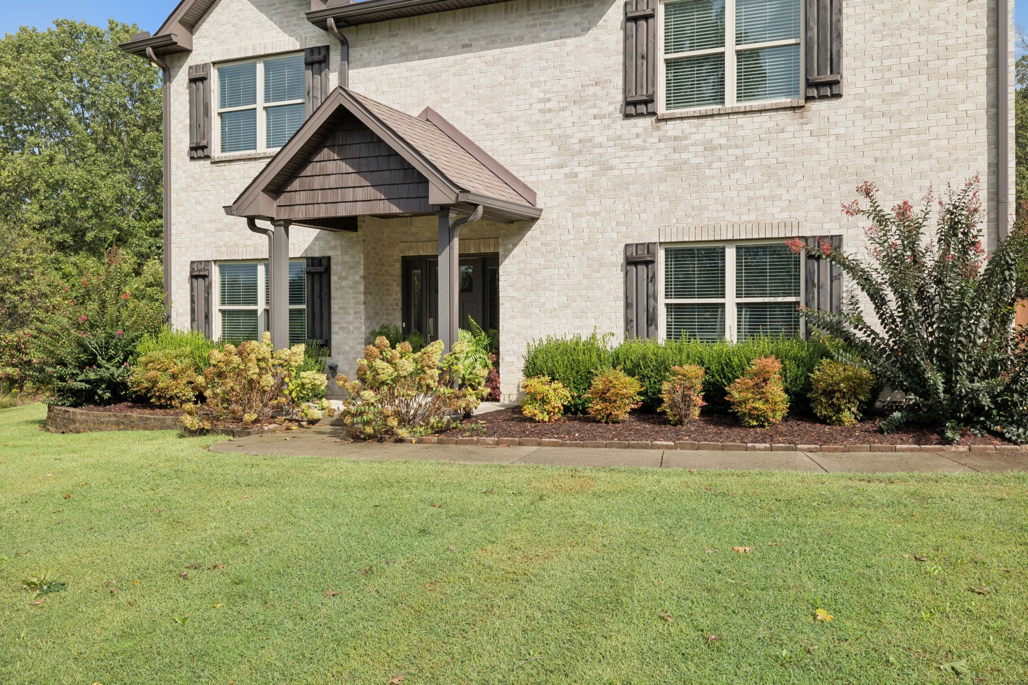 1964 Harkreader Road Mount Juliet, TN 37122 - Photo 9 of 80 a front view of a house with a yard