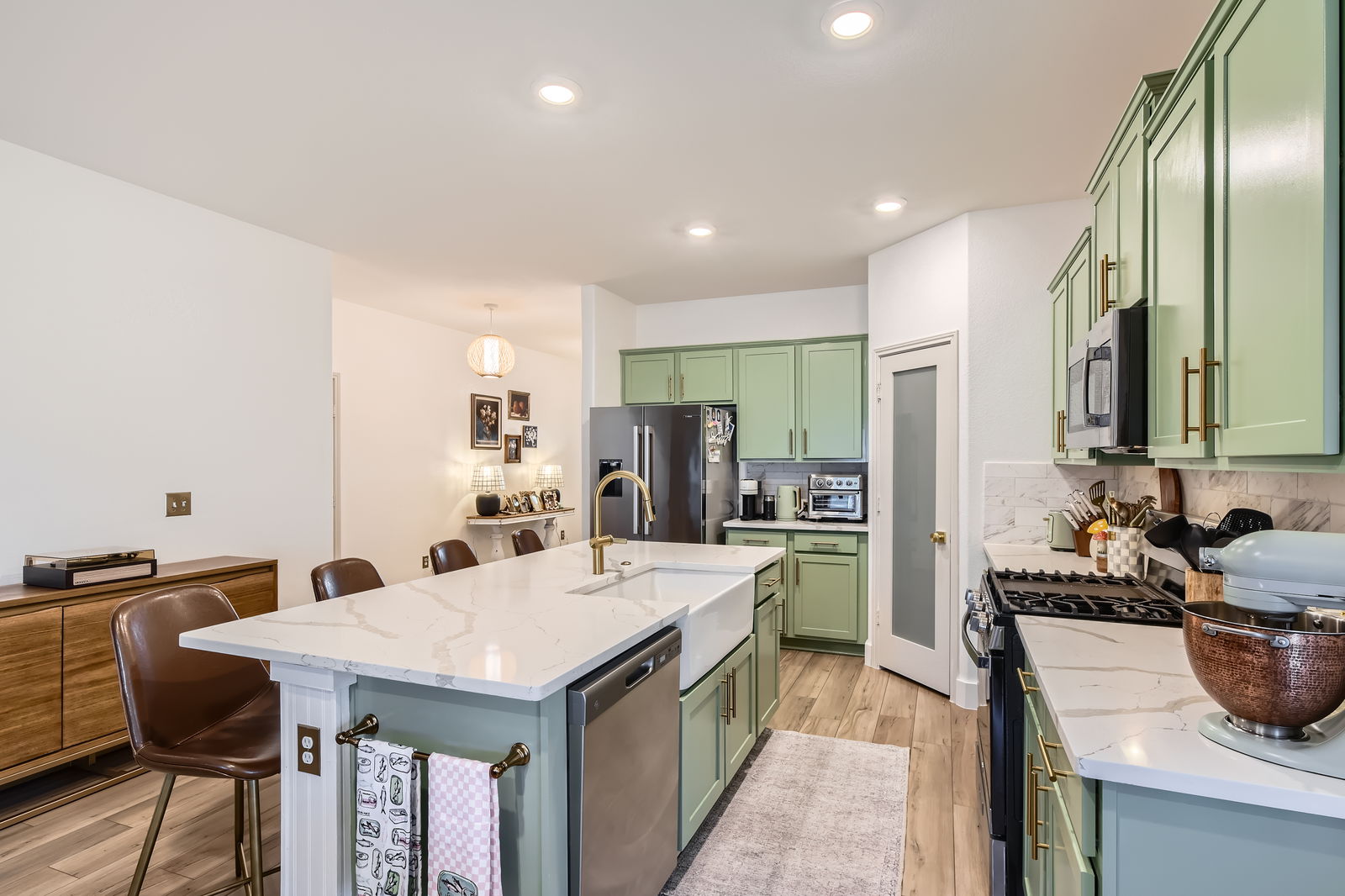261 Mendoza Kyle, TX 78640 - Photo 12 of 28 a large kitchen with a table and chairs