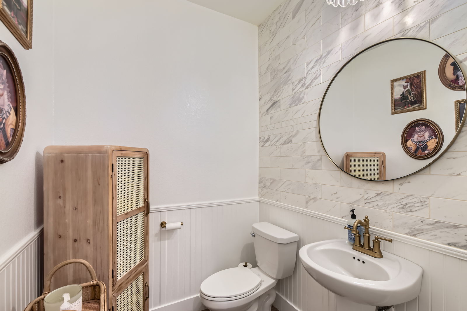 261 Mendoza Kyle, TX 78640 - Photo 13 of 28 a bathroom with a toilet a sink and a mirror