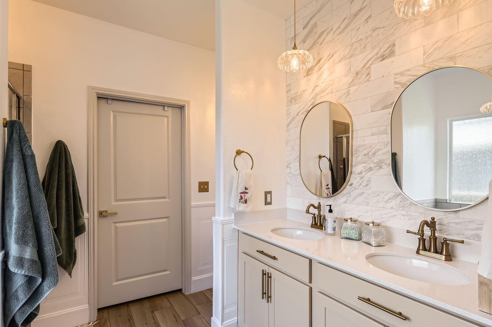 261 Mendoza Kyle, TX 78640 - Photo 16 of 28 a bathroom with a double vanity sink and a mirror