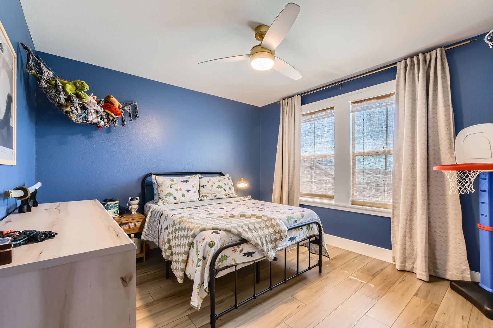 261 Mendoza Kyle, TX 78640 - Photo 20 of 28 a bedroom with a bed and a flat screen tv