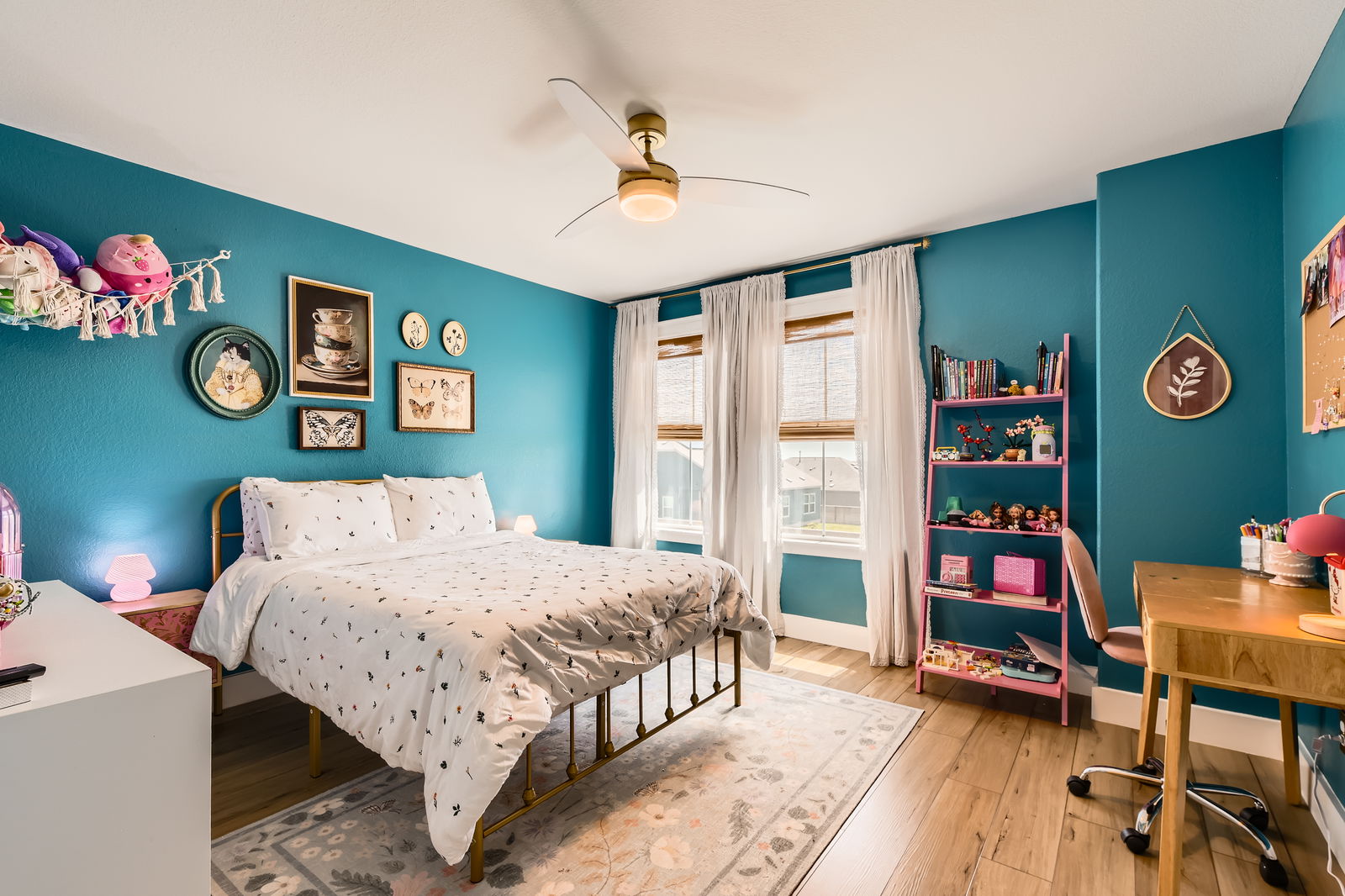 261 Mendoza Kyle, TX 78640 - Photo 21 of 28 a bedroom with a bed and a bookshelf