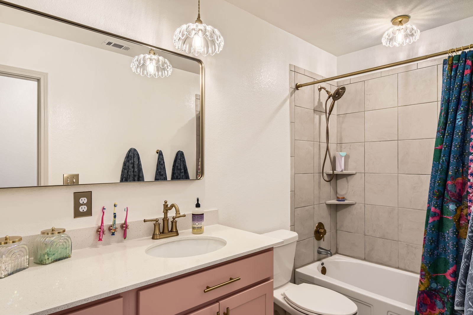 261 Mendoza Kyle, TX 78640 - Photo 23 of 28 a bathroom with a sink a toilet and shower