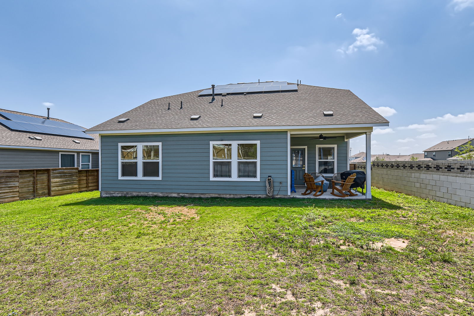 261 Mendoza Kyle, TX 78640 - Photo 27 of 28 a view of a house with a yard and sitting area
