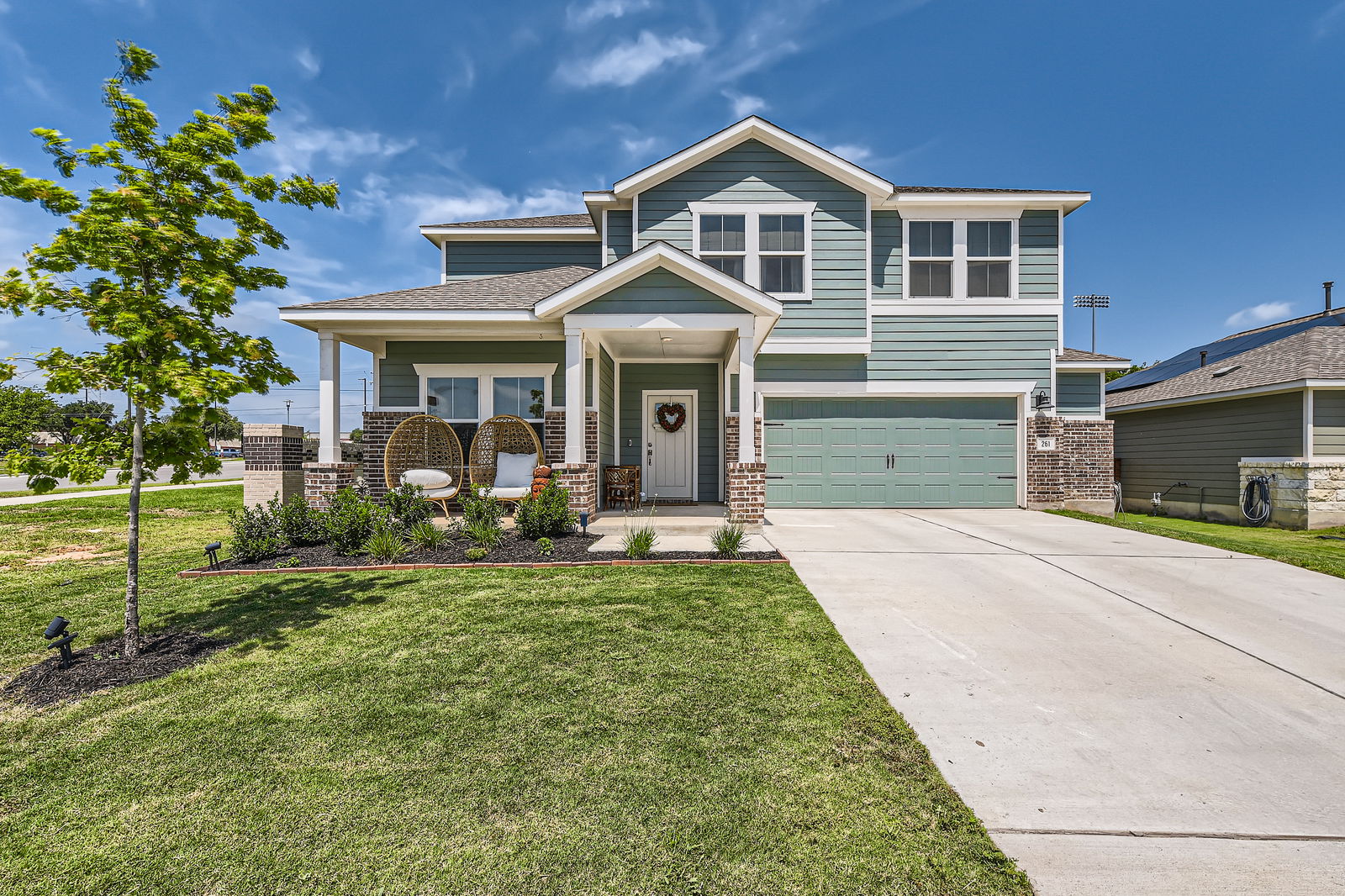 261 Mendoza Kyle, TX 78640 - Photo 4 of 28 a front view of a house with a yard