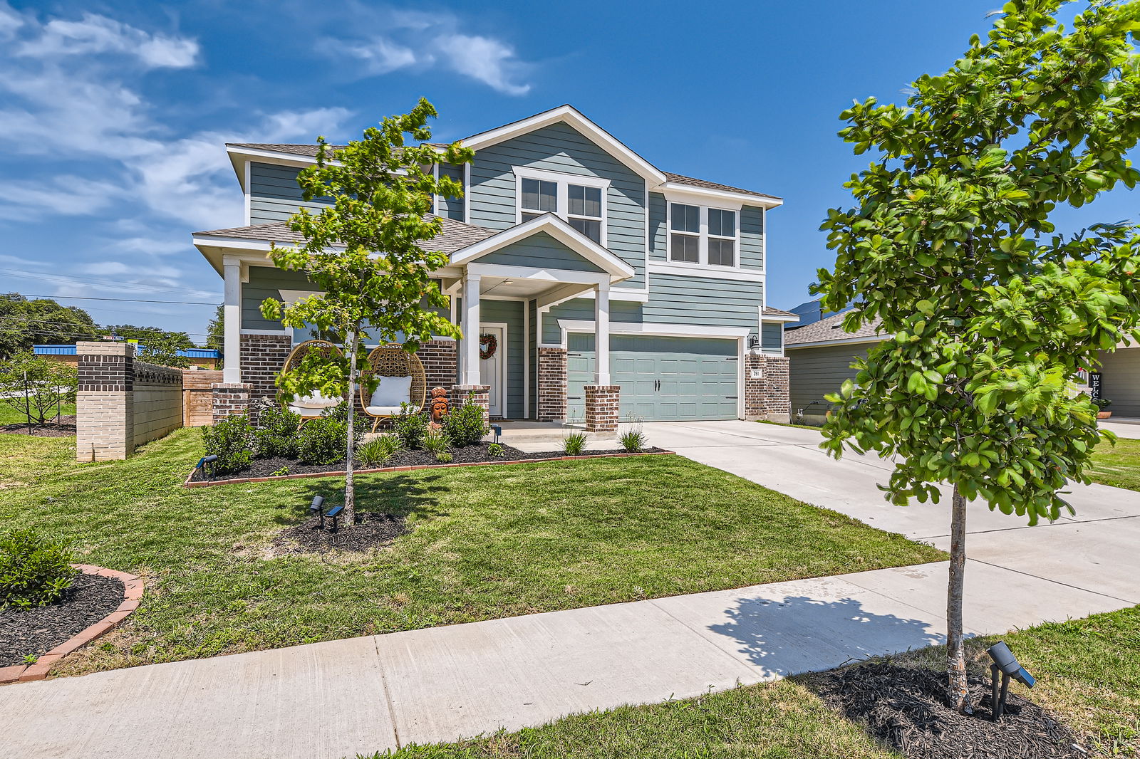 261 Mendoza Kyle, TX 78640 - Photo 5 of 28 a front view of a house with garden