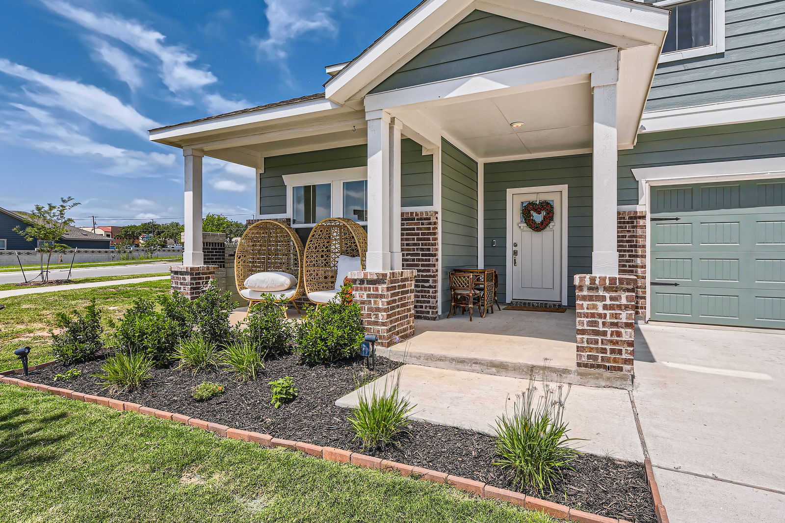 261 Mendoza Kyle, TX 78640 - Photo 6 of 28 a front view of a house with garden