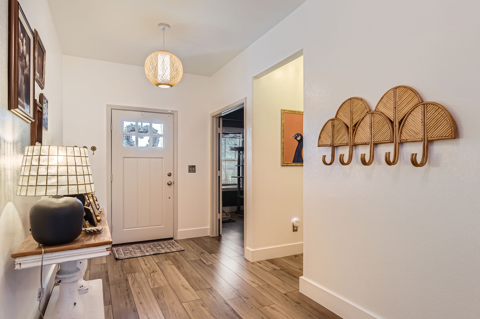 261 Mendoza Kyle, TX 78640 - Photo 7 of 28 a view of entryway with wooden floor
