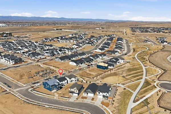 an aerial view of residential building and lake view