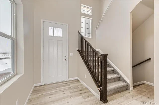 a view of kitchen with wooden floor