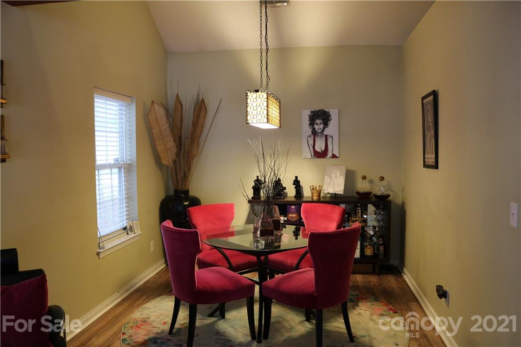 6414 Nevin Road Charlotte, NC 28262 - Photo 6 of 17 a view of a dining room with furniture and window