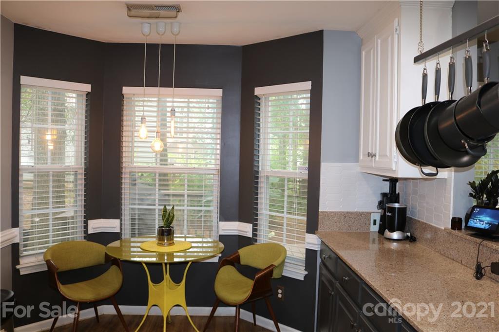 6414 Nevin Road Charlotte, NC 28262 - Photo 9 of 17 a view of a dining room with furniture and window