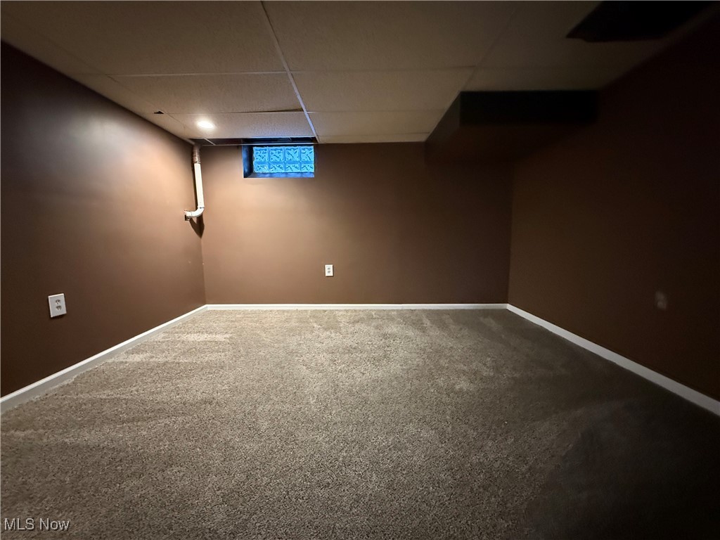 6290 Crossview Road Independence, OH 44131 - Photo 20 of 24 Basement with carpet flooring and a paneled ceiling