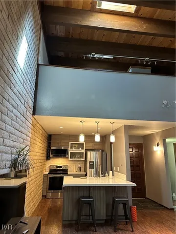 a kitchen with a stove and a microwave