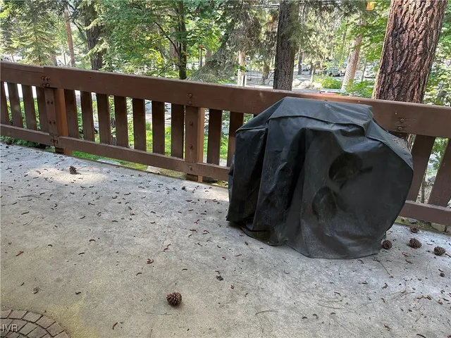 a view of backyard and deck