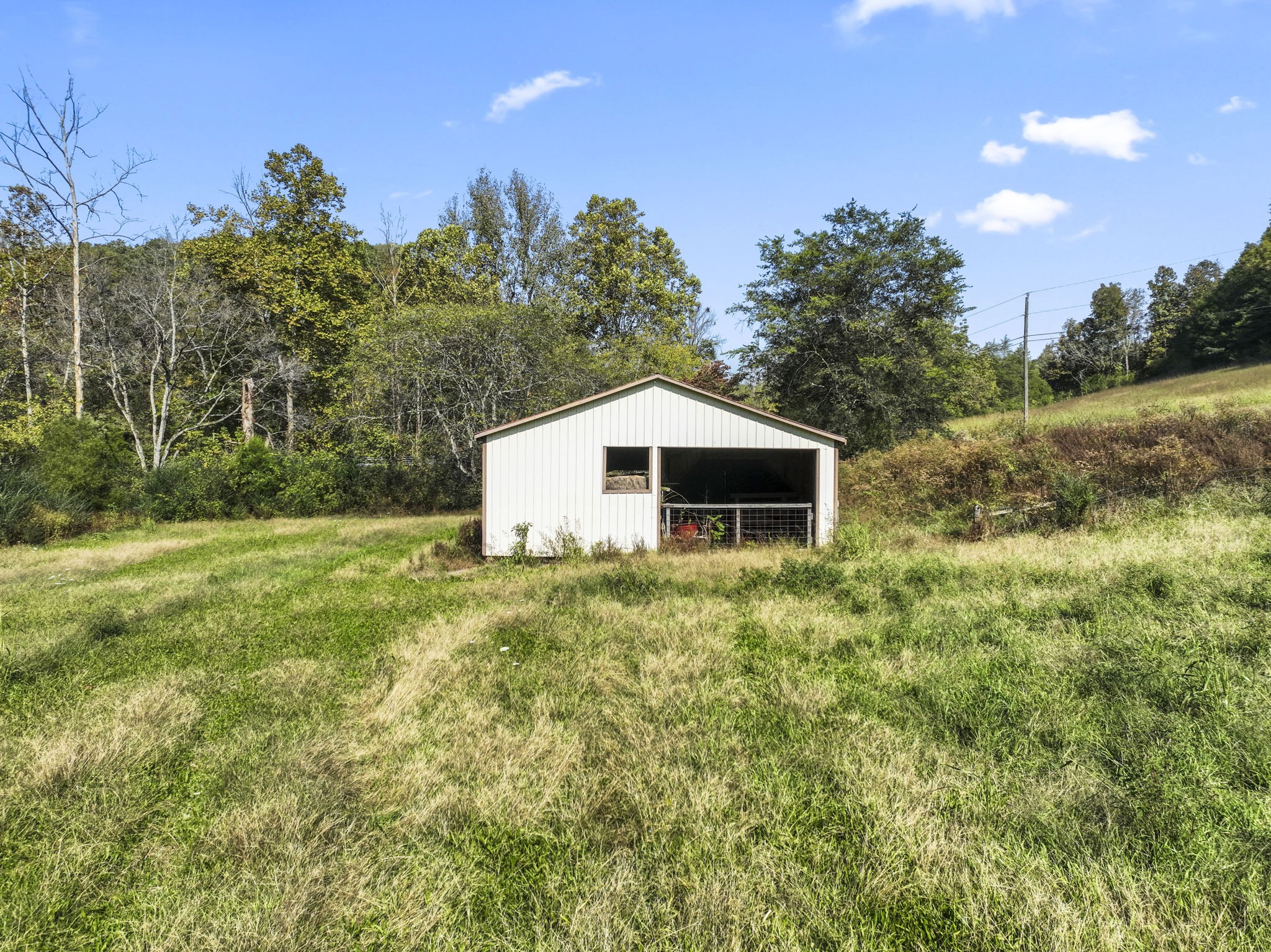 171 George Hill Road Manchester, TN 37355 - Photo 17 of 70 a house view with a backyard space