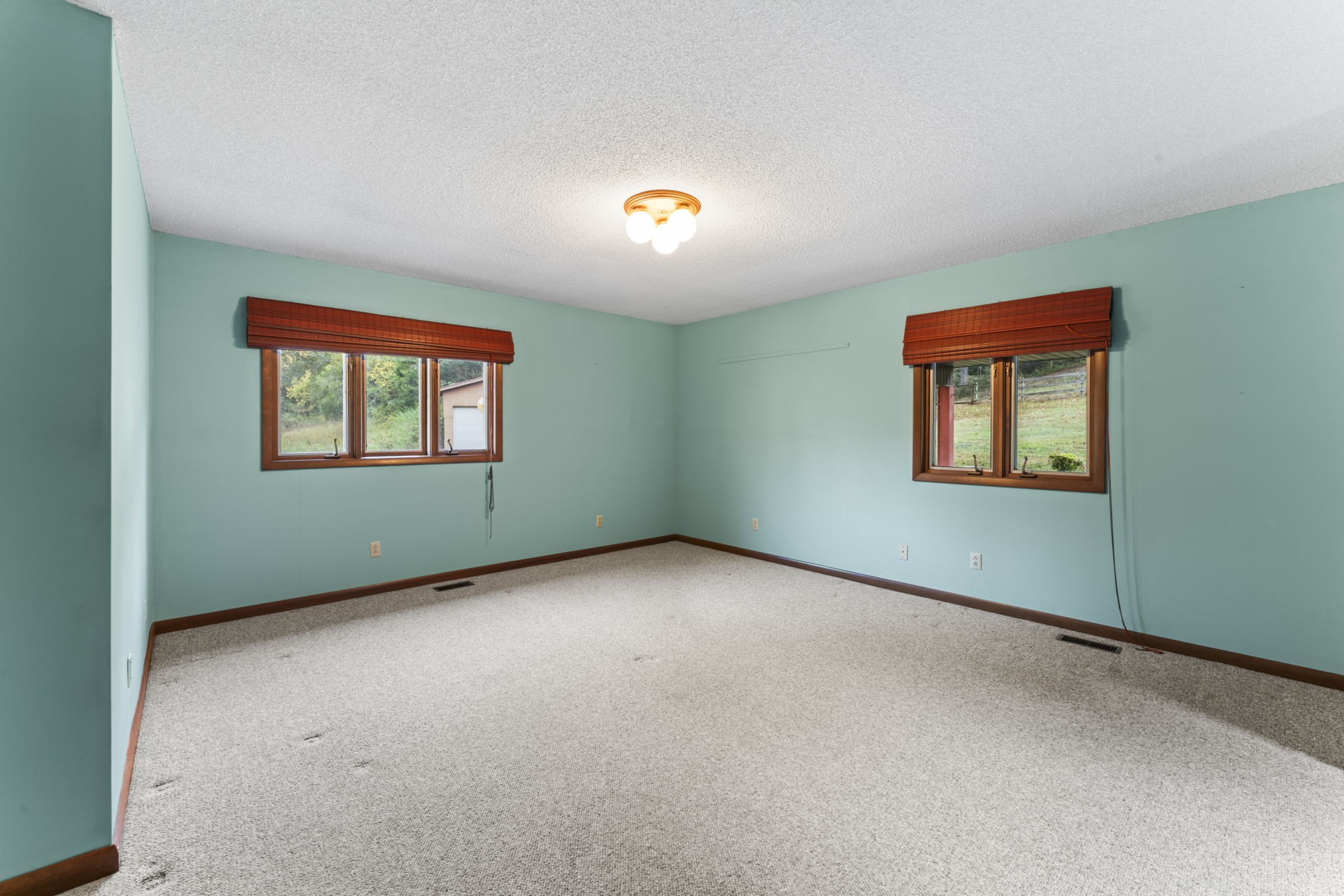 171 George Hill Road Manchester, TN 37355 - Photo 43 of 70 an empty room with a window and a fireplace