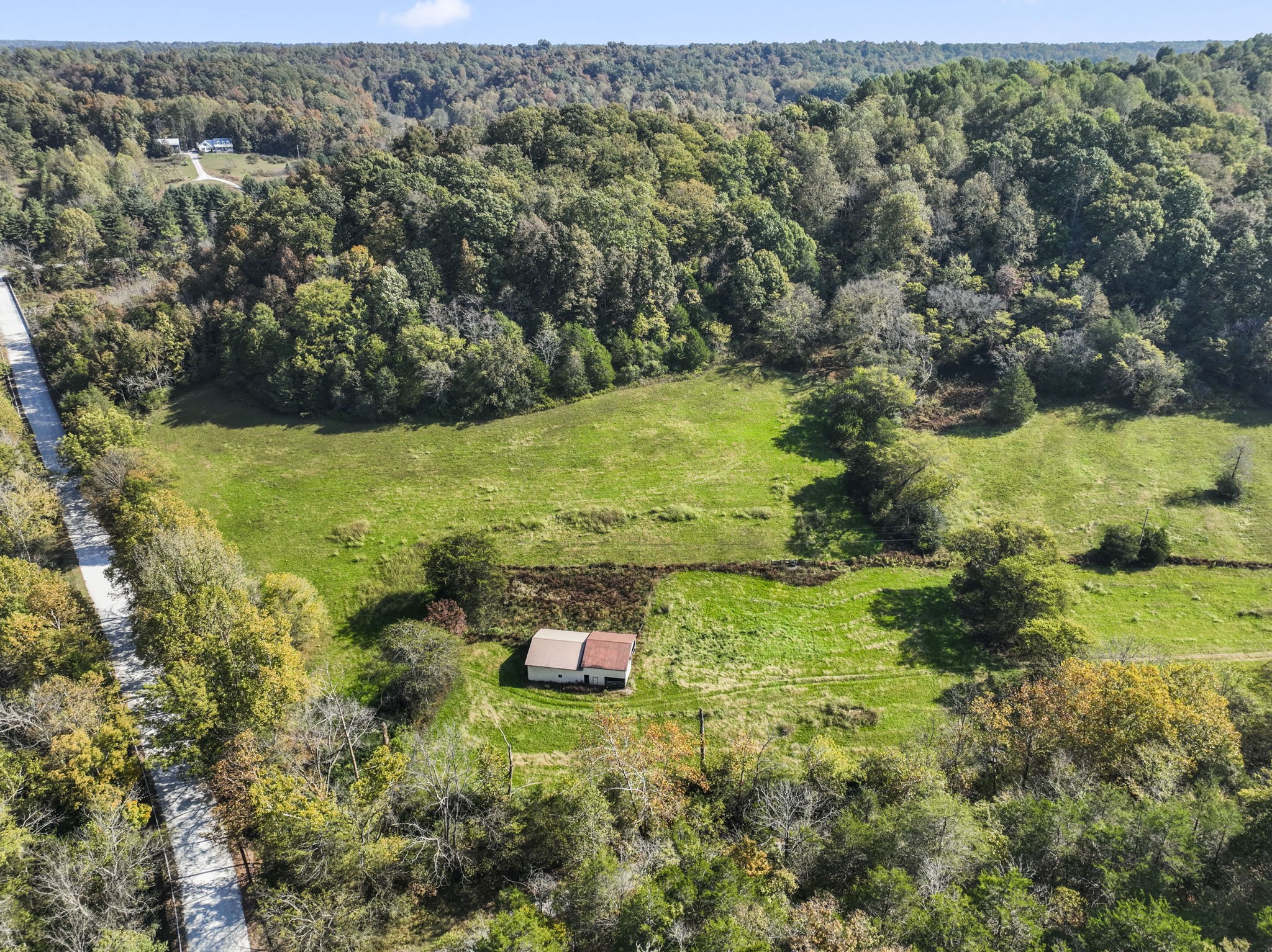 171 George Hill Road Manchester, TN 37355 - Photo 64 of 70 a view of a garden with a building