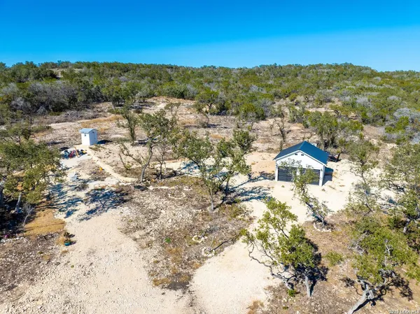 a view of a backyard of a house