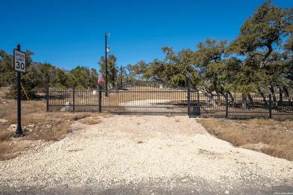 a view of a fence in the yard